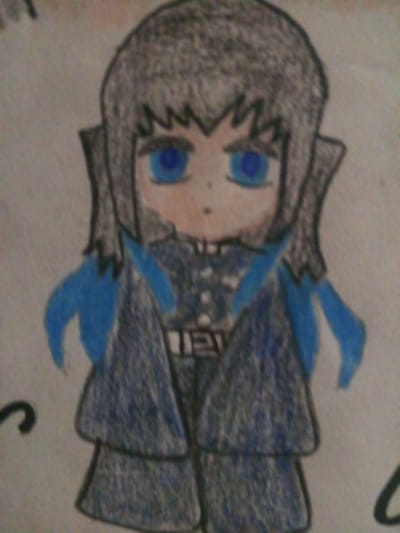 A drawing depicts a stylized anime character with gray hair, blue eyes, and a light skin tone. The character wears a dark uniform with a high collar and a lighter-colored belt. Large blue shoulder pieces extend from the uniform. The drawing is rendered in a child-like style with colored pencils. The background is a light, textured paper. There is no indication of a specific location, city, or country, and therefore no information can be provided about Altagracia, Venezuela.