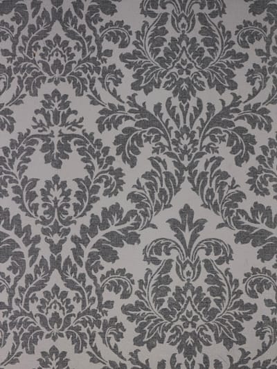 The image displays a close-up, full-frame view of a grey and white damask pattern. The pattern consists of ornate, symmetrical floral motifs and scrolling leaf designs, repeated across the surface. There are no people, objects, actions, or interactions visible in the image. The scene is devoid of any recognizable city or environmental context, and therefore cannot be associated with Bila Tserkva, Ukraine, or any specific location. The image is purely a surface texture.