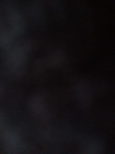 This is a dark, abstract image with no discernible subjects, objects, or environmental details. It does not contain any information about the city of Usman, Russia.