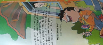 The image depicts a colorful illustration, likely from a children's book or comic, featuring cartoon characters. The scene is rendered in a vibrant, somewhat abstract style with bold outlines and flat areas of color.
In the foreground, a boy with dark hair and a green shirt is depicted with his mouth wide open in an exaggerated expression. He is holding a yo-yo, which is suspended by a string. His left hand is extended, appearing to be in motion with the yo-yo. To his right, a segment of another character is visible, wearing an orange garment and blue trousers.
To the left of the boy, text is visible, written in a vertical orientation. The text appears to be in Spanish and describes a situation involving a meeting and a vaccine, with phrases like "reunión seria," "cara de difunto," and "vacuna nos dura un minuto." Below this text, the name "Montserrat Rull" is written, followed by "(venezolana)," indicating a Venezuelan origin.
In the background, a partially visible character with dark hair and a smiling face peers out from behind a window frame. This character is wearing a patterned shirt. The overall environment appears to be depicted with earthy tones, including browns and greens, suggesting an outdoor or natural setting. The context of La Tagua, Venezuela is not directly depicted or inferable from the visual elements of the illustration itself. The image is a fictional rendering and does not represent a specific real-world location in La Tagua.