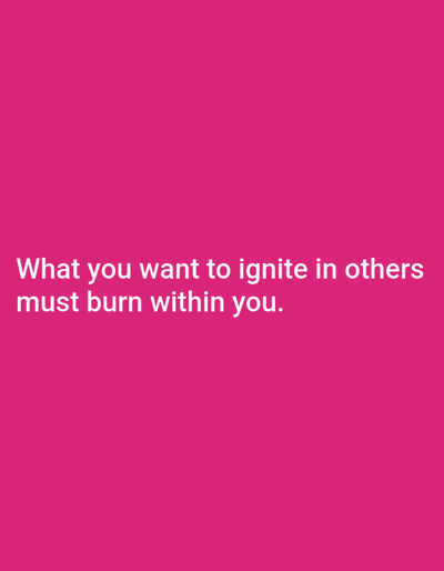 The image is a photograph with a solid hot pink background. In the center of the image, white text is displayed in two lines. The top line reads "What you want to ignite in others" and the bottom line reads "must burn within you." There are no people, objects, or any discernible environmental features present in the image beyond the text and its background. The location of Priego De Córdoba, Spain is not depicted or suggested in any way by the image.
