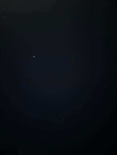 The image depicts a dark night sky with several visible stars. The location is Lehvaz, Armenia, although the image itself does not provide any distinguishing landmarks or features confirming the precise location within the city. There are no visible people, subjects, objects, actions, or interactions other than the stars in the night sky. The environment is a dark, clear night.