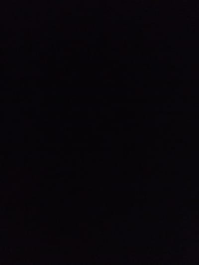 The image is completely black, making it impossible to describe any visual content, including the location, people, subjects, objects, actions, interactions, or environment in El Valle del Espíritu Santo, Venezuela, or anywhere else.