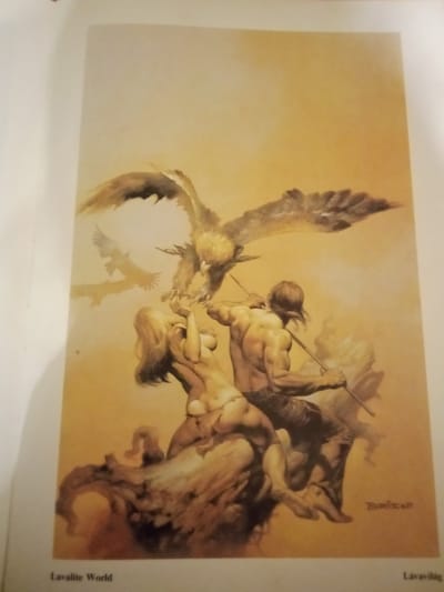 The image is a painting featuring a mythological or fantasy scene. In the foreground, a muscular male figure stands with a spear, engaged with a female figure who appears to be struggling or being lifted. A large bird, possibly an eagle, hovers above them, its wings spread wide and beak open as if attacking or interacting with the figures. Another bird is visible in the background, in silhouette. The figures and birds are rendered in a dramatic, painterly style with strong lighting and shadows, set against a warm, gradient background that transitions from yellow to orange. At the bottom left of the painting, the text "Lavalite World" is visible, and at the bottom right, a signature that appears to be "Boris Vallejo" or similar is present. The image is part of a book or publication, with a white border surrounding the painting. There is no information or visual evidence within the image that suggests any connection to the city of Zhmerynka, Ukraine.
