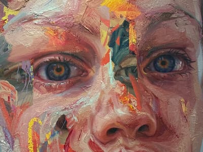 This is a close-up, highly textured portrait painting of a human face, rendered in an impasto style with thick, visible brushstrokes. The primary focus is on the eyes and the central region of the face, including the bridge and tip of the nose.
The subject's eyes, wide and intense, feature prominent blue irises with warm, golden-orange rings around the dark pupils, creating a striking contrast. Eyelashes are visible, and the whites of the eyes are depicted with subtle color variations rather than pure white. The surrounding skin is painted in a range of flesh tones, from delicate pinks and light browns to deeper reds and ochres.
The painting exhibits a fragmented, almost collage-like quality, with patches of vibrant and contrasting colors laid over and alongside the skin tones. Bright yellows, oranges, blues, greens, and purples break up the facial structure, particularly around the forehead, cheeks, and between the eyes. These abstract color blocks and textured layers give the impression of depth, complexity, or perhaps an emotional landscape. The nose is rendered with similar thick paint application, showing highlights and shadows through color shifts and varying textures. No specific time of day, weather, or location cues are visible within the artwork itself, nor is any text present. The overall impression is one of a deeply expressive and intricate portrayal.