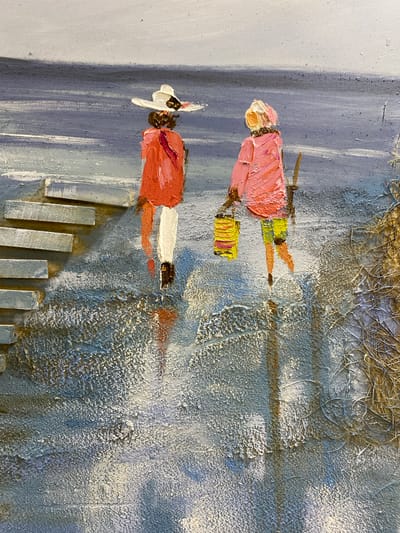 This is a close-up, vertical, top-down photograph of an oil painting. The painting depicts a textured, abstract representation of a scene with two figures. The figures appear to be rendered with thick impasto brushstrokes, suggesting a bold, expressive style.
The upper figure is wearing a pink garment, possibly a dress or coat, with yellow accents on the lower legs. This figure is carrying a yellow object, possibly a bag or basket, with red and pink details. The lower figure is wearing an orange-red garment, white trousers, and brown footwear. This figure also sports a white hat with a brown detail at the brim. Both figures are depicted in profile, walking.
The background is a mix of textures and colors. There are areas of rough, sandy texture in off-white and grey, interspersed with patches of blue and muted brown. The ground beneath the figures appears to be a grey, slightly textured surface with vertical lines. In the lower part of the image, a series of light grey, rectangular, raised elements are arranged in a staggered pattern, reminiscent of steps or a textured pathway.
The overall impression is of a daytime scene, possibly in a warm climate, given the bright colors of the clothing. The rough textures and thick paint application contribute to a sense of materiality and perhaps a slightly gritty or rural environment. There are no visible text elements in the painting. The scene suggests movement and everyday activity, though the abstract nature of the rendering leaves room for interpretation.