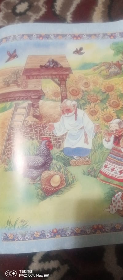 This is an illustration from a book depicting a rural scene. In the foreground, a gray chicken with a red comb stands near a nest containing a single light brown egg. To the right of the chicken, an elderly man with a white beard, wearing a white tunic and blue pants, extends his right hand towards the chicken. His left hand is open and gesturing downwards. Beside him, a young girl or woman is shown with her back slightly turned, wearing a white shirt with red and white embroidered trim and a white head covering. She is holding a musical instrument that resembles a flute. In the background, a wooden structure with a thatched roof stands, with a ladder leaning against it. A field of sunflowers stretches beyond the structures, and in the far distance, several traditional Uzbek houses with sloping roofs are visible. The sky is a light blue with scattered clouds. The scene is depicted in a folk art style. The image does not contain any specific information or visual cues to indicate the location in Tahmach, Uzbekistan.