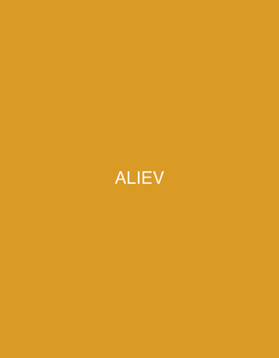 The image features a minimalist composition with a solid, plain background in a mustard yellow or golden-orange color. Centered prominently on this background is the word "ALIEV" written in all capital letters. The text is rendered in a clean, white, sans-serif typeface. No people, objects, or specific scene elements are visible, and no activity or event is taking place. The image is devoid of any discernable time of day, weather, or location cues beyond the text itself. The overall impression is one of stark simplicity, focusing solely on the brand name or surname against a flat color field.