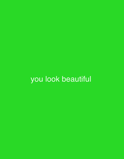 A green background with the white text "you look beautiful" in the center.