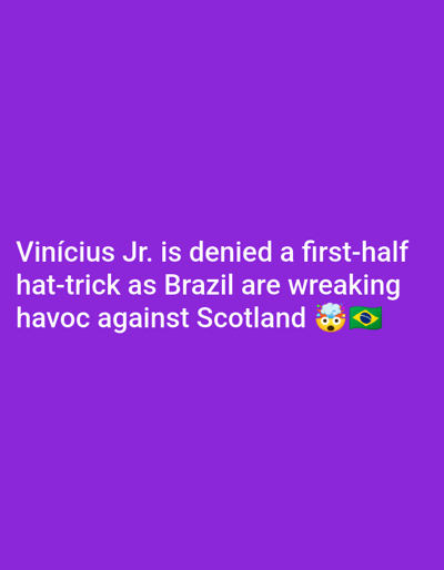 A photograph shows a purple background with white text that reads "Vinícius Jr. is denied a first-half hat-trick as Brazil are wreaking havoc against Scotland." To the right of the text are two emojis: a shocked face with a party hat and a Brazilian flag. The image is not located in Unguwar Shanu, Nigeria.