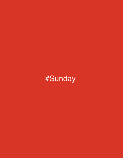 The scene, located in Le Cannet-des-Maures, France, is a digital image featuring a solid, uniform red background. Centered horizontally and vertically on this red field is the white text, sans-serif font, stating "#Sunday". No individuals, specific objects beyond the text, actions, or discernible environmental features are present. The composition is entirely graphical and abstract.
