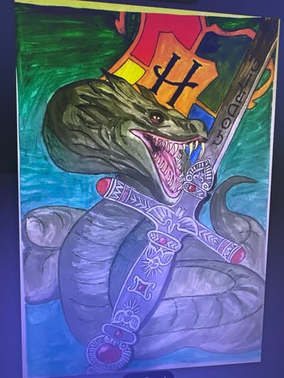 The image is a painting of a dragon-like creature with its mouth open, revealing sharp teeth. The creature is coiled around a decorative sword. In the background, there is a colorful banner with a stylized letter "H" and other geometric shapes. The colors used are vibrant, with greens, blues, reds, oranges, and yellows. The painting style appears to be watercolor or acrylic. The image does not contain any information about the city of Mineralnye Vody, Russia.