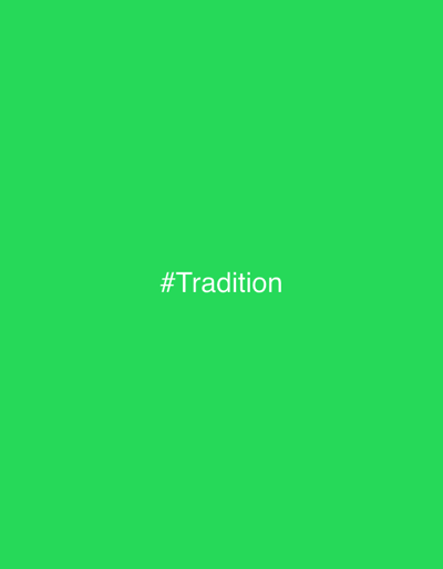 The image displays a plain, vibrant green background. Centrally placed on this monochromatic field is the word '#Tradition' rendered in white capital letters, preceded by a hashtag symbol. There are no other discernible subjects, objects, or detailed scenes within the image. No activity or event is depicted. The simple composition lacks visual cues for time of day, weather, or specific geographical location within the image frame. The location context provided for this media file is Veauche, France. The overall aesthetic is minimalist and text-focused.