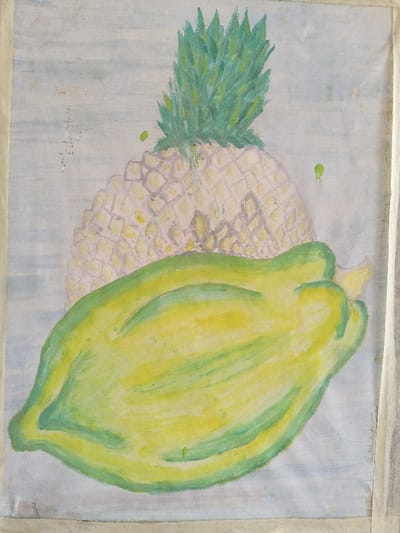 The image displays a watercolor painting depicting a still life arrangement of two fruits. A pineapple, characterized by a pale yellow body with a defined grid pattern and a green leafy crown, occupies the upper background. Partially obscuring the pineapple, an elongated papaya rests in the foreground, rendered with a mottled green and yellow coloration. The background is a plain, light blue-grey wash. The artwork is on paper, exhibiting visible vertical edges or adhesive marks along the left and right margins. Faint handwritten script, including "Edo abasi," is present on the upper left portion of the image. This scene is located in Barnawa, Nigeria.