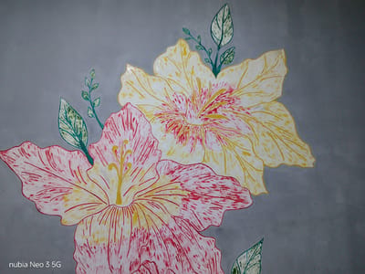 The image shows a close-up of a wall painting of two hibiscus flowers and some leaves against a gray background. The flower in the foreground is predominantly pink with red streaks and yellow accents in the center and on the petals. The flower behind it is yellow with red streaks in the center and yellow outlines. Several green leaves with dark green veins are depicted around the flowers. The painting appears to be a decorative mural. The bottom left corner of the image contains the text "nubia Neo 3 5G", indicating it is a watermark from a mobile device. There is no visible information or context within the image to place it in Angren, Uzbekistan.