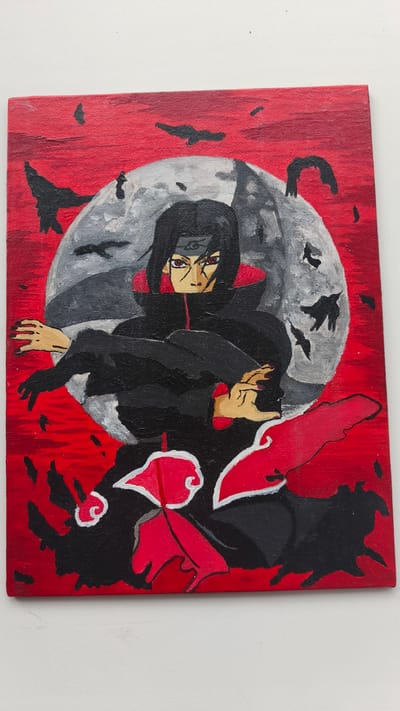 The image is a painting of the anime character Itachi Uchiha, depicted against a red, cloudy background with a large grey moon. Itachi is wearing his signature black Akatsuki cloak with red lining and has the Sharingan active in his eyes. He is in a dynamic pose, with his hands outstretched. Scattered black shapes, resembling birds, are visible in the sky. The lower part of the painting features the red and white cloud emblem of the Akatsuki organization. The painting is on a canvas with visible texture. The location in the city of Buguruslan, Russia, is not discernible from the image.