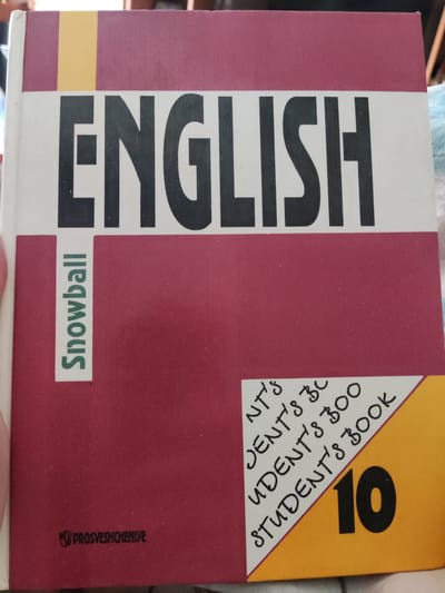 A book titled "ENGLISH" is displayed. The book has a maroon cover with a large white section featuring the title in bold black letters. To the left of the title, a vertical green label reads "Snowball". In the lower right corner of the maroon section, a white triangle is overlaid on a yellow section, with the text "NT'S DENT'S BC UDDENT'S 300 STUDENT'S BOOK" written diagonally in black ink. The number "10" is prominently displayed in bold black font on the yellow section. The publisher's logo, "PROSVESHCHENIYE", is visible in the bottom left corner of the maroon section. The image does not provide any information about the city of Tver, Russia, or any details about people, actions, interactions, or the specific environment.