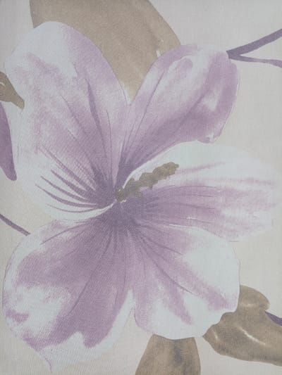 The image shows a close-up of a floral pattern on fabric, likely wallpaper or upholstery. The dominant element is a large, stylized flower with pale purple petals and a lighter center. Hints of brown leaves or other floral elements are also visible. The background is a neutral, creamy color with a textured appearance, suggesting a woven material. There are no people, actions, or environmental details visible in this cropped image, and it is not possible to determine its location in Labinsk, Russia.
