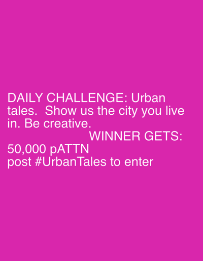 The image is a graphic with text overlaid on a vibrant pink background. The text, in white sans-serif font, announces a "DAILY CHALLENGE: Urban tales. Show us the city you live in. Be creative." Below this, it states "WINNER GETS: 50,000 PATTN" and provides instructions for entry: "post #UrbanTales to enter". The graphic appears to be an announcement for a creative challenge, likely a social media contest, related to urban life and storytelling. There are no people, objects, or scene details visible beyond the text and background color. The context of Stróża, Poland is not visually represented in the image itself.