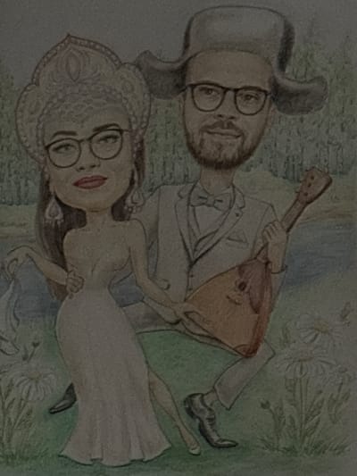 A watercolor caricature depicts a couple in a grassy, outdoor setting with a body of water and trees in the background. The woman, on the left, wears a traditional Russian headdress (kokoshnik), glasses, and a light-colored, form-fitting gown. She has earrings and her hair is visible. She is holding the man's hand. The man, on the right, wears a fur hat, glasses, and a suit with a bowtie. He is playing a balalaika. Both figures are seated. Daisies are scattered around them. The overall style is whimsical and romantic. There is no indication of the city of Tutaev, Russia, in this image.