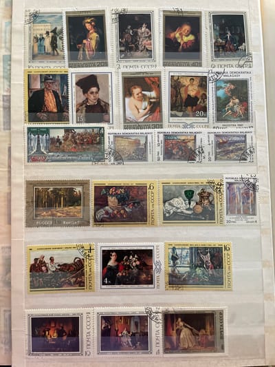 The image shows a collection of postage stamps arranged in rows. The stamps feature various artistic depictions, including portraits, genre scenes, and landscapes. Some stamps have text in Cyrillic and other languages, suggesting they are from different countries and eras. There are no visible indications of the city of Osentsy, Russia, in the image.