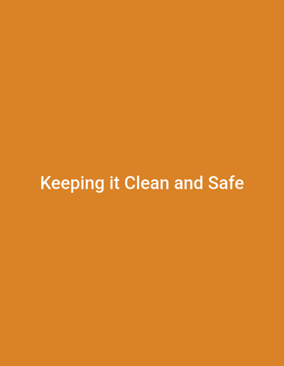 The image is a solid orange background with white text centered on it. The text reads "Keeping it Clean and Safe". The image does not depict any specific location in Gwagwada, Nigeria, nor does it contain any people, subjects, objects, actions, or interactions. It is purely text on a colored background.
