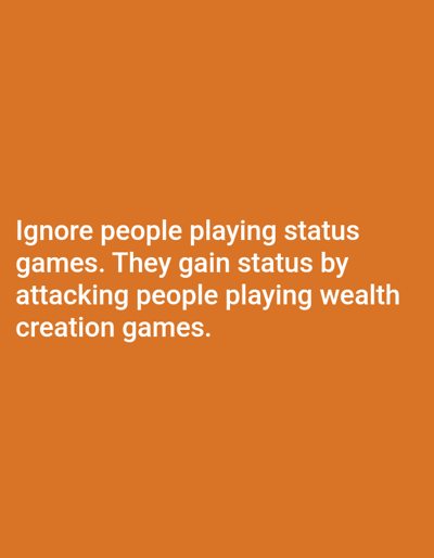 The image features a quote against an orange background. The quote advises ignoring those who play "status games," as they achieve status by attacking individuals involved in "wealth creation games." The text is rendered in white, bold font. The message implicitly favors wealth creation over status seeking.