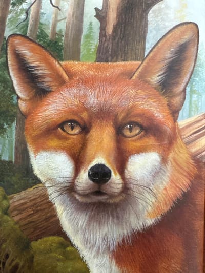 This is a close-up, vertically oriented painting of a red fox's face, set in a woodland environment. The fox is the sole subject, depicted in sharp detail with its reddish-brown fur, white markings around its muzzle and eyes, and dark, alert ears. Its gaze is directed slightly off-camera, conveying a sense of alertness and curiosity. The background is rendered in softer, impressionistic strokes, suggesting trees and foliage with muted greens and browns, and a light, possibly misty, atmosphere. The lighting appears natural, suggesting daytime, perhaps early morning or late afternoon, with soft light illuminating the fox's features. There are visible textures of tree bark and leaves, hinting at a natural, outdoor setting. No text is visible in the image. The overall impression is one of a detailed and lifelike portrayal of a wild animal in its habitat.