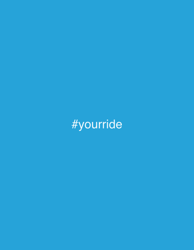 A solid light blue background with the text "#yourride" centrally positioned. The text is white, with a clean, sans-serif font, and appears to be a promotional hashtag. The image is simple and minimalist, designed to draw attention to the text.