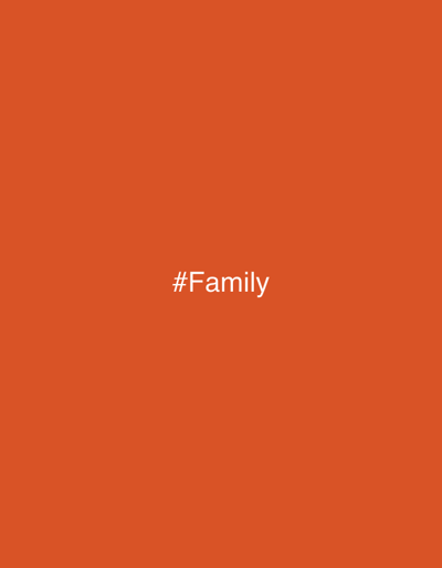 The image displays a solid orange rectangular field. Centered within this field, the text '#Family' appears in white capital letters, preceded by a hash symbol. No individuals, specific objects, actions, or interactions are visually depicted within the image. The environment shown is solely the uniform orange color. While no specific physical location is visually represented by the image content, this image is associated with the city of Payakumbuh, Indonesia.