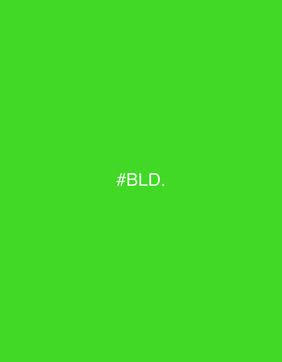 The image is a solid green field with the text "#BLD." in white, located approximately in the center. There are no discernible details suggesting the location of Tomilino, Russia. There are no people, objects, actions, interactions, or environment present in the image, apart from the green color and the text.