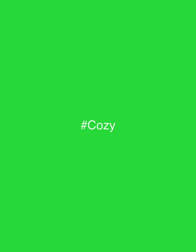 The image, originating from the city of Kliczków, Poland, displays a uniformly rendered digital field of vibrant lime green (RGB 51, 255, 0). Centrally positioned on this monochromatic background is the white text '#Cozy', presented in a clear, sans-serif font. No people, animate subjects, physical objects beyond the textual graphic, actions, interactions, or three-dimensional environmental features are present within the visual confines of the image.