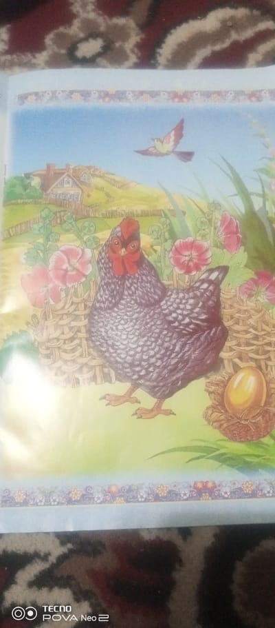 The image is a drawing of a chicken with a golden egg in a nest. There is a bird flying in the sky, a house in the background, and flowers surrounding the chicken. The drawing is set in a rural landscape with green fields and a blue sky. The image is not geotagged and does not contain any information about the city of Tahmach, Uzbekistan.