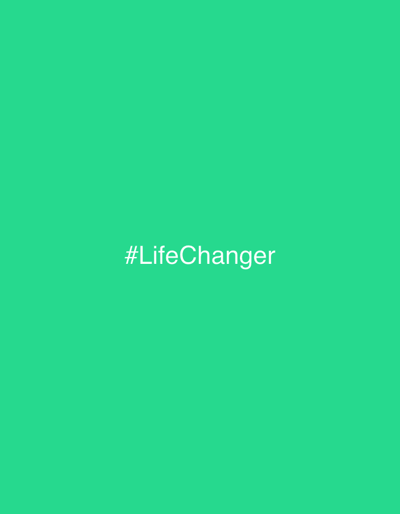The image displays a solid, uniform field of medium-bright green color that occupies the entire frame. Centered horizontally and vertically on this background is white, sans-serif text, which reads "#LifeChanger". No individuals, tangible objects, discernible actions, or environmental features beyond the colored field and text are depicted within the image. This image is situated in the city of Virak, Montenegro.