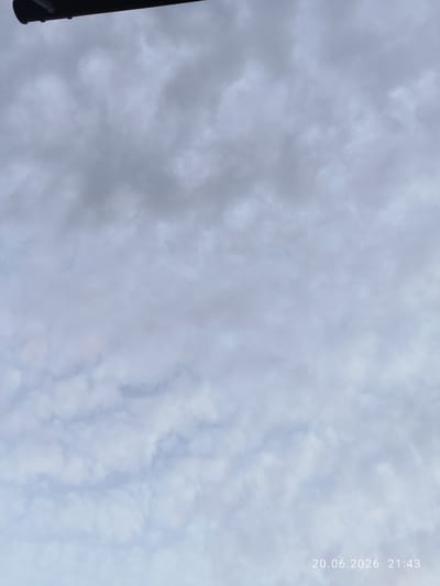 A close-up shot of a cloudy sky with a black horizontal object in the top left corner. The bottom right corner shows the date and time "20.06.2026 21:43". The image is too abstract to determine a specific location in Northampton, United Kingdom.