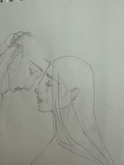 This is a close-up pencil sketch on textured paper, depicting two faces in profile, very close to each other, with a sense of intimacy or deep connection. The sketch is in grayscale and appears to be unfinished, with some lines being more defined than others.
The foreground shows the profile of a person facing left. Their head is tilted slightly upwards, and their eyes are partially closed. The nose is prominent, and the lips are slightly parted. The hair is pulled back, with some strands loosely framing the face.
Above and behind this figure is another face, also in profile, facing right. This figure's head is tilted down towards the first person, almost as if leaning in for a kiss or a whisper. The eyes of this upper figure are open, and they are looking downwards, with a gentle expression. Their hair is depicted as flowing, with long, sweeping lines suggesting movement.
The overall impression is one of tenderness and closeness. There are no background elements or setting details visible, as the focus is entirely on the interaction between the two faces. The sketch is done on a light gray paper that has visible texture and a few small specks. There is no visible text in the image. The context of Drozhzhino, Russia, does not provide any visual cues within the sketch itself.