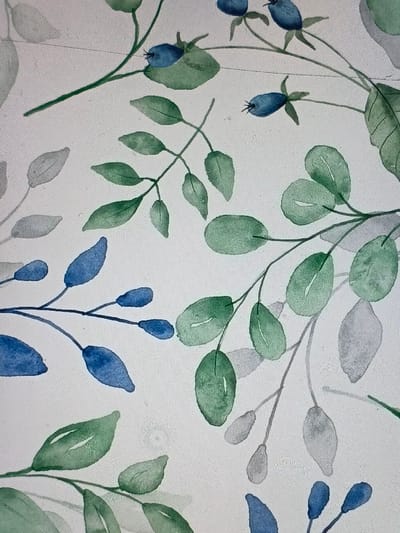 The image showcases a watercolor painting featuring various leaves and berries. Green leaves of different shapes, some rounder and others more pointed, intertwine with blue berries and leaves. A soft, light background allows the delicate washes of color to stand out, creating a natural and airy feel. The leaves and berries are distributed across the frame, creating a sense of organic growth. Some elements are rendered in muted grey tones, adding depth and dimension to the composition.