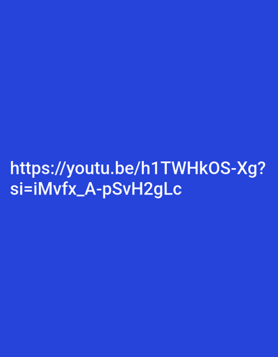 The image shows a simple composition featuring a YouTube link. The link reads "https://youtu.be/h1TWHKOS-Xg?si=iMvfx_A-pSvH2gLc" and is displayed in white text against a solid, deep blue background. The text is clear and easily readable, positioned towards the center of the frame, with ample blue space surrounding it. There are no other elements or visual distractions present.