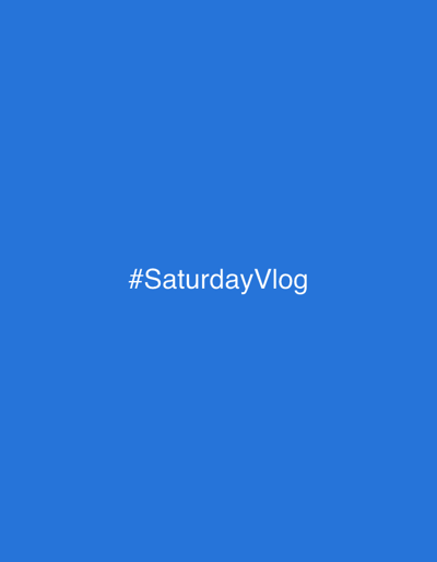 The image is a solid blue background with white text in the center. The text reads "#SaturdayVlog". There are no people, objects, actions, or interactions visible in the image. The location in the city of Shipkovo, Bulgaria is not depicted or implied by the image content.