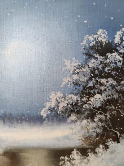 This is an oil painting of a winter scene. The painting depicts a snow-covered tree with dark branches and white foliage against a pale blue, softly lit sky. Small white and yellow dots are scattered across the sky, suggesting falling snow or stars. In the lower part of the painting, a misty landscape transitions to a dark, reflective body of water. The overall mood is serene and peaceful, evoking the quiet beauty of a winter's night. The texture of the canvas is visible, indicating it's a traditional painting. There is no visible text in the image. The location context of Rybnitsa, Moldova, provides a regional setting for this winter landscape.