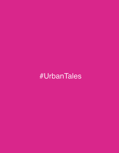 A solid pink background fills the image. Centered on the background, in white text, is the hashtag "#UrbanTales".