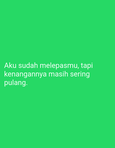 The image is a close-up, eye-level shot of a bright green background with white text. The text reads "Aku sudah melepasmu, tapi kenangannya masih sering pulang." This translates from Indonesian to English as "I have let you go, but the memories often come back." There are no people, objects, or discernible environmental features other than the text and the solid green background. There is no information in the image to indicate a location in Sugihwaras, Indonesia.