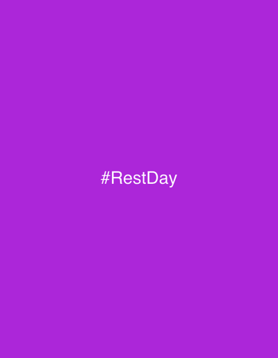 The image displays a solid, vibrant purple background that fills the entire frame. Centered horizontally and vertically on this monochromatic field is the white text '#RestDay', rendered in a sans-serif typeface. No people, subjects, objects, actions, interactions, or environmental features are depicted. The scene is located in the city of Cortona, Italy.