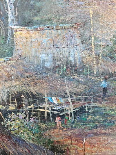 The painting depicts a rustic scene, likely a village setting in Bang Sare, Thailand, characterized by its natural environment and simple structures. In the foreground, to the left, a cluster of flowering plants in shades of pink, purple, and green adds a touch of color against the predominantly earthy tones. Behind the plants, a wooden structure with a thatched roof is visible, suggesting a dwelling or a common area. Laundry, consisting of brightly colored fabrics, hangs from a makeshift line strung between wooden poles, indicating daily life activities.
Several figures are present in the scene. To the left, near the flowering plants, are three individuals, two of whom appear to be women wearing traditional clothing, one in a pink outfit and another in a green and red garment. A third figure, possibly a child, stands nearby. Further to the right, a lone figure, dressed in a light blue garment, stands facing away from the viewer, looking towards the background. In the mid-ground, behind the thatched structure, another group of figures, smaller in scale and less defined, are visible near what appears to be another building. The background features a dense, textured wall of vertical brushstrokes, suggestive of vegetation or a building facade, with patches of light and shadow that create a sense of depth. The overall impression is one of a quiet, perhaps humid, tropical environment, with a focus on human activity within a natural landscape. The brushwork is thick and textured, giving the painting a tactile quality.