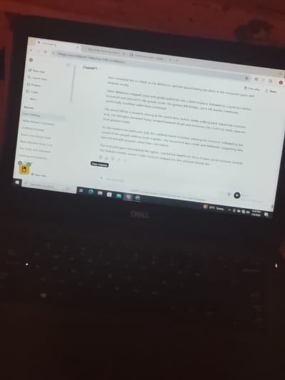 A Dell laptop displays a ChatGPT interface. The laptop is on a dark surface. The displayed text appears to be part of a creative writing narrative. The system tray indicates the time is 9:14 PM and the date is 3/6/2023. The weather is reported as 33°C and sunny. There are no indications of Oke Ogun, Nigeria or any people.
