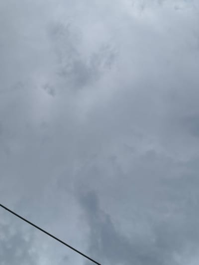 The image depicts a cloudy, gray sky. A single, dark power line stretches diagonally from the lower right corner of the frame towards the upper right, suggesting an outdoor setting. Given the prompt includes the location of Dabovets, Bulgaria, the image appears to be a view of the sky with overhead power lines in that city.