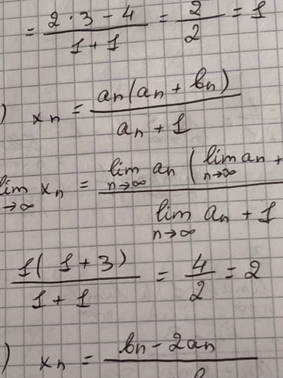 The image displays handwritten mathematical equations on a gridded notebook page. The equations involve fractions, variables like 'n', 'a', and 'b', and limit notation (lim n→∞). The handwriting is somewhat stylized, with some characters resembling cursive. There are no elements in the image that suggest a location in Jrarat, Armenia, or any urban environment. It is a close-up shot of written mathematical work.