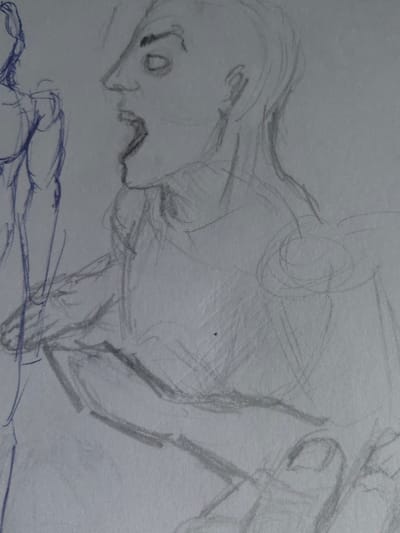The image is a pencil sketch of a person's head and shoulders. The person is facing to the left, with their mouth open as if they are shouting or singing. The drawing is incomplete, with the lines of the body being faint and the head being the only feature fully drawn. The coordinates provided place the drawing in Yoksolovo, Russia, but there is no context provided in the image that would suggest this is the case. The image was likely drawn on a piece of paper and then photographed. The background is white and the lighting is even. The sketch was likely created by a human with a pencil.
