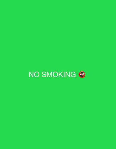 The image displays a solid, uniform green background. Centered horizontally and slightly below the vertical midpoint, the white text "NO SMOKING" is presented in an uppercase, sans-serif typeface. Immediately to the right of the text is a universally recognized "No Smoking" symbol, depicted as a red circle with a diagonal line bisecting a lit cigarette. No people, specific objects beyond the text and symbol, or actions are depicted. The green background appears consistent with a digital display or a chroma key screen. There are no visual elements within the image that indicate a specific physical location in the city of Saraia, Bulgaria, or any other real-world environment.