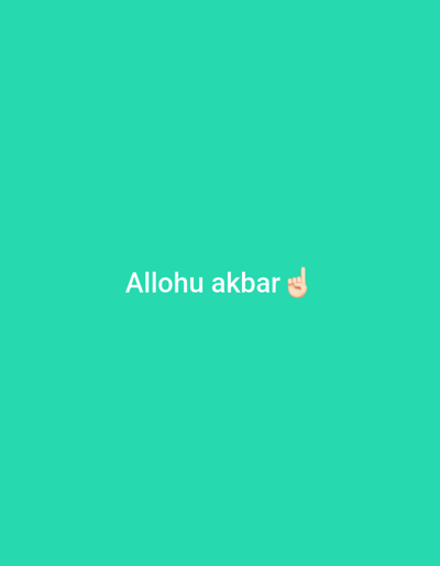 The image is a digital graphic featuring a solid, uniform teal-colored background. Centered horizontally and slightly above the vertical midpoint, white text reads "Allahu akbar". Immediately to the right of the text, a light-skinned hand emoji with a raised index finger pointing upwards is present. The image does not depict any physical location, specific people, subjects, objects, actions, or interactions within the city of Kindik ózek, Uzbekistan, or any other real-world environment.